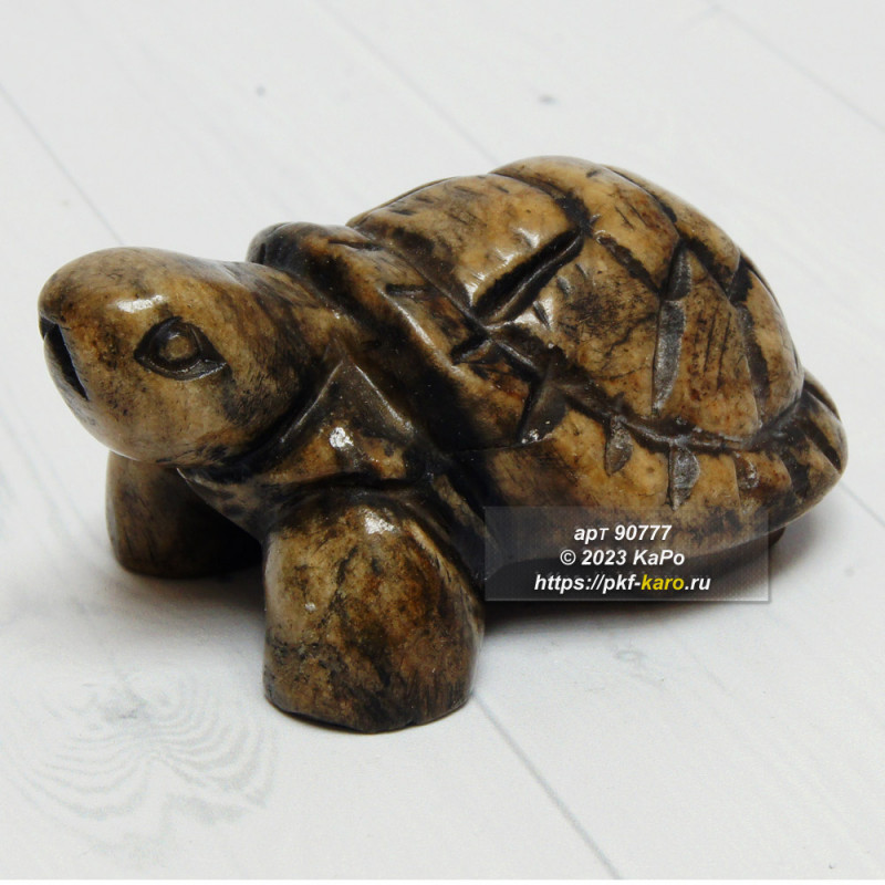 Черепаха из кальцита Черепаха из кальцита. На фото типовое изделие, оригинал может отличаться по размеру и весу (в пределах 10%), цвету, рисунку камня. 