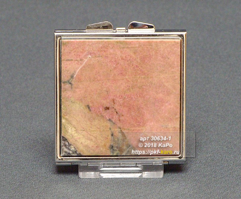 Зеркало карманное из родонита одностороннее Зеркало карманное с одной накладкой из родонита. На фото типовое изделие, оригинал может отличаться по размеру и весу (в пределах 10%), цвету, рисунку камня. 