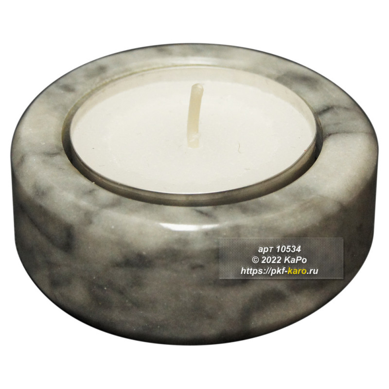 Подсвечник круглый из мрамора  Подсвечник из мрамора для тепловой свечи. На фото типовое изделие, оригинал может отличаться по размеру и весу (в пределах 10%), цвету, рисунку камня. 