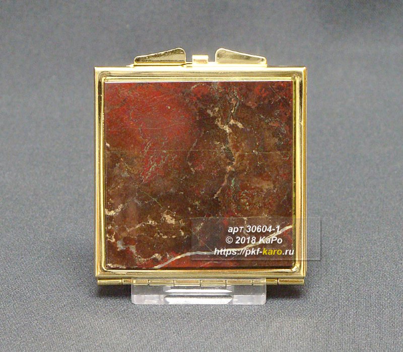 Зеркало карманное из яшмы одностороннее Зеркало карманное с 1 накладкой из яшмы. На фото типовое изделие, оригинал может отличаться по размеру и весу (в пределах 10%), цвету, рисунку камня. 
