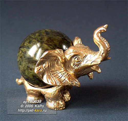 Фигура Слон Фигурка слона из бронзы с яйцом из змеевика. На фото типовое изделие, оригинал может отличаться по размеру и весу (в пределах 10%), цвету, рисунку камня. 
