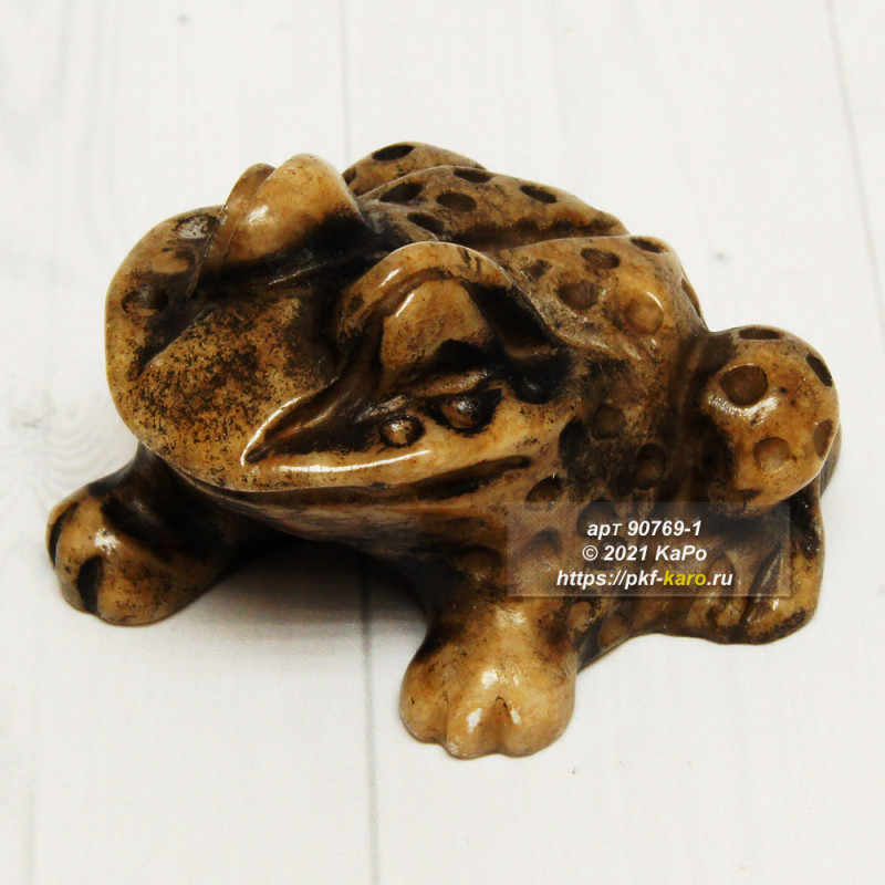 Лягушка из кальцита  Фигурка из кальцита "Лягушка". На фото типовое изделие, оригинал может отличаться по размеру и весу (в пределах 10%), цвету, рисунку камня. 