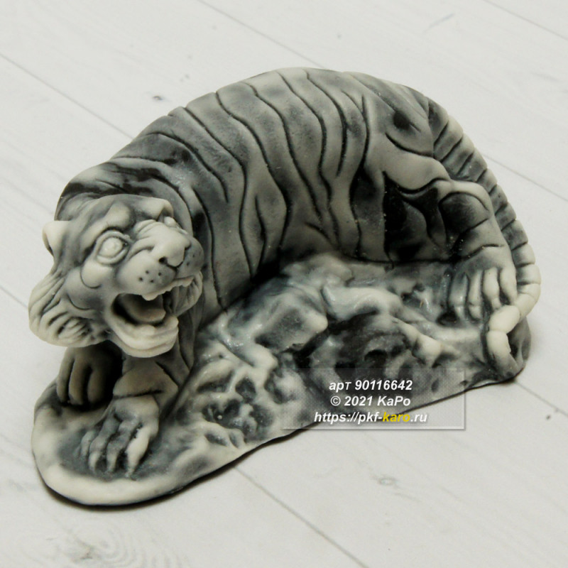 Тигр малый из мрамолита  Тигр малый из мрамолита. На фото типовое изделие, оригинал может отличаться по размеру и весу (в пределах 10%), цвету, рисунку камня. 