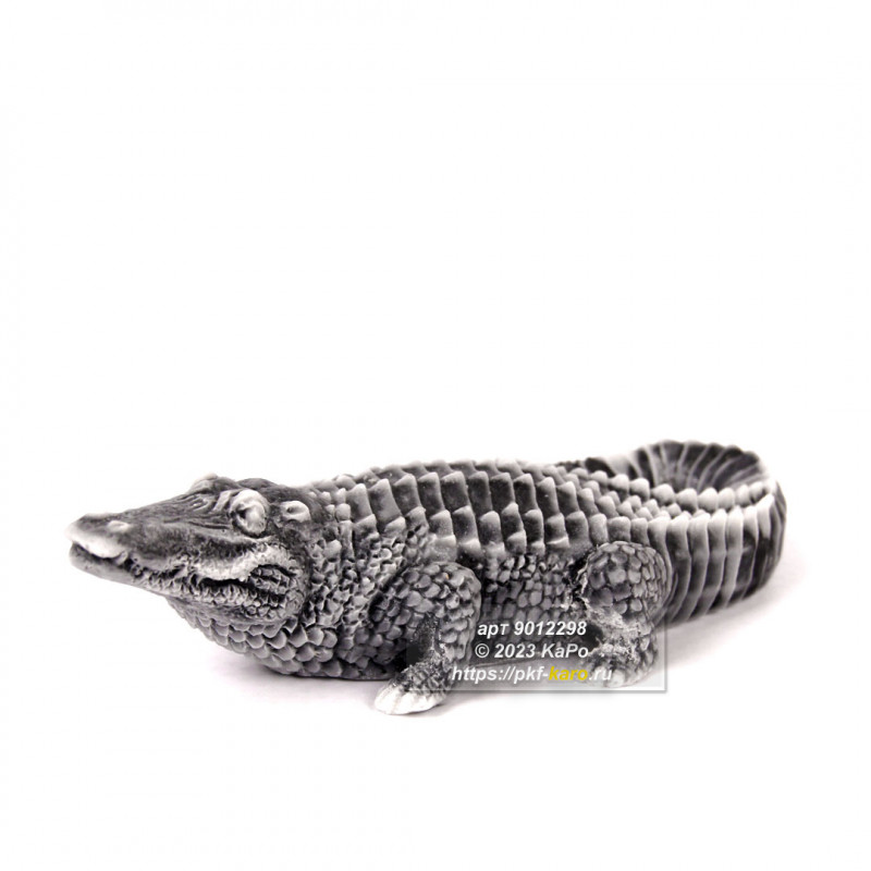 Фигурка из мрамолита &quot;Крокодил&quot; Сувенир "Крокодил" из мрамолита. На фото типовое изделие, оригинал может отличаться по цвету и рисунку камня.