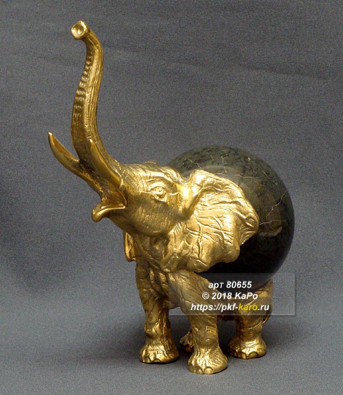 Фигура Слон из бронзы и змеевика Фигурка слона выполнена из бронзы, шар из змеевика. На фото типовое изделие, оригинал может отличаться по размеру и весу (в пределах 10%), цвету, рисунку камня. 