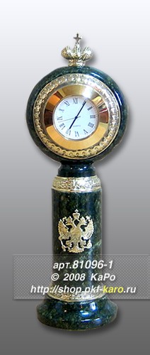Часы из змеевика и бронзы &quot;Корона&quot; Часы из змеевика и бронзы "Корона". В комплекте часы с кварцевым механизмом. Часовой механизм вынимается для смены батарейки. На фото типовое изделие, оригинал может отличаться по размеру и весу (в пределах 10%), цвету, рисунку камня. 