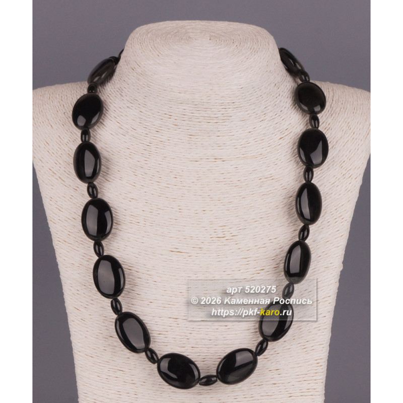 Бусы из чёрного агата, плоский  Элегантное украшение из натурального камня подойдёт женщине любого возраста и станет изюминкой её коллекции. Глубокий чёрный цвет универсален: бусы гармонично дополнят как деловой костюм, так и вечерний наряд.

Почему стоит выбрать эти бусы:

Натуральный камень: чёрный агат с благородным блеском.

Энергетика камня: агат считается мощным оберегом, дарящим силу и защиту.

Комфорт: бусы удобно носить, они не создают ощущения тяжести.

Эффектность: глубокий цвет и лаконичный дизайн привлекают внимание и подчёркивают индивидуальность.

Подарите не просто украшение, а частичку древней магии — выберите бусы из чёрного агата!

На фото типовое изделие, оригинал может отличаться по размеру и весу (в пределах 10%), цвету, рисунку камня. 
